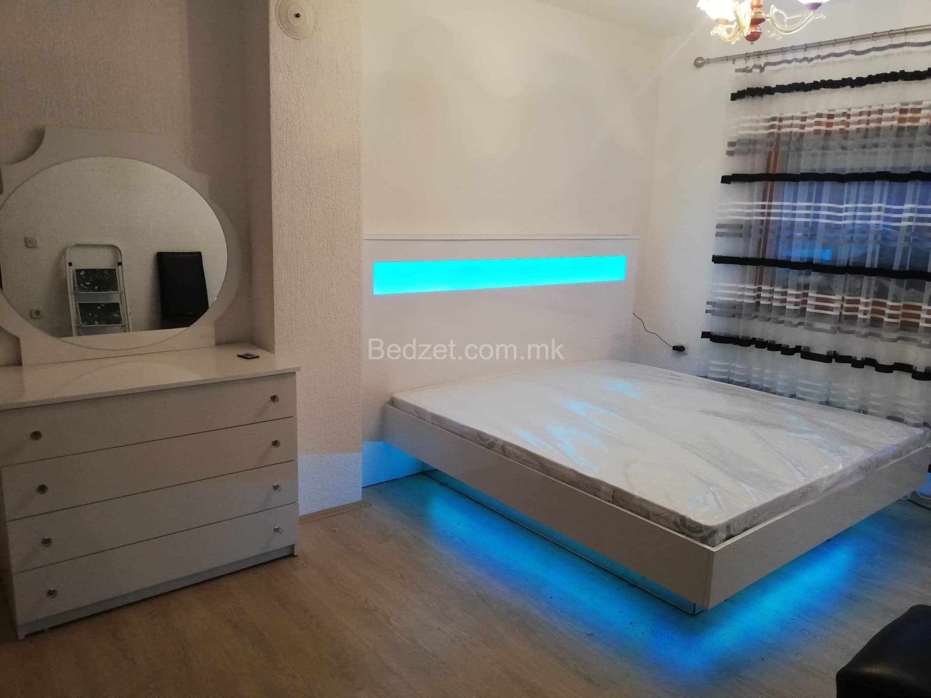 Modern white chest of drawers with LED light — Bedžet